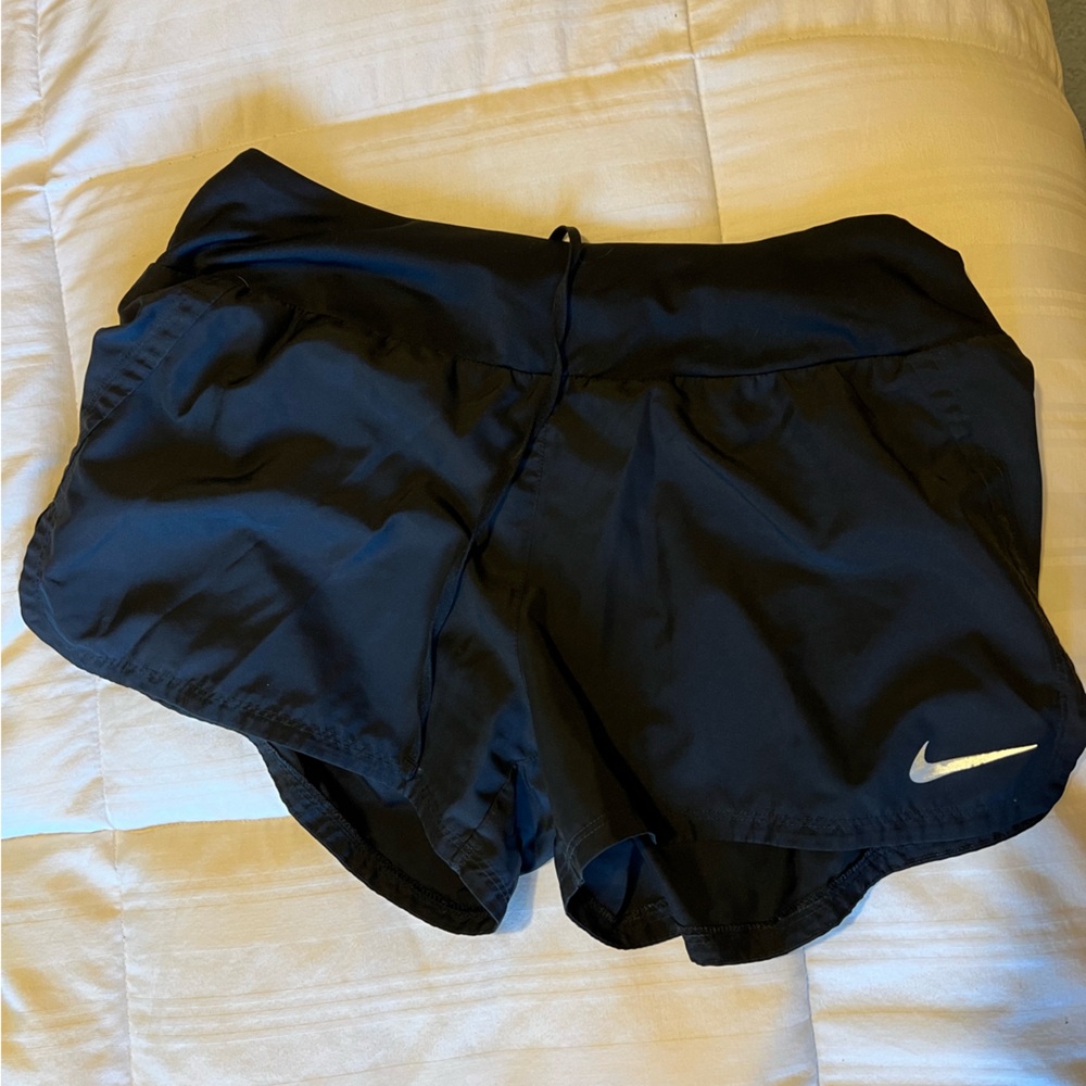 Black Nike running shorts